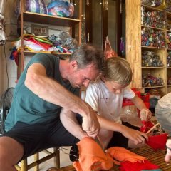 Father-and-young-son-making-a-lantern-in-Hoi-An