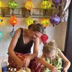Mother-and-daughter-bonding-while-creating-a-lantern-in-Hoi-An