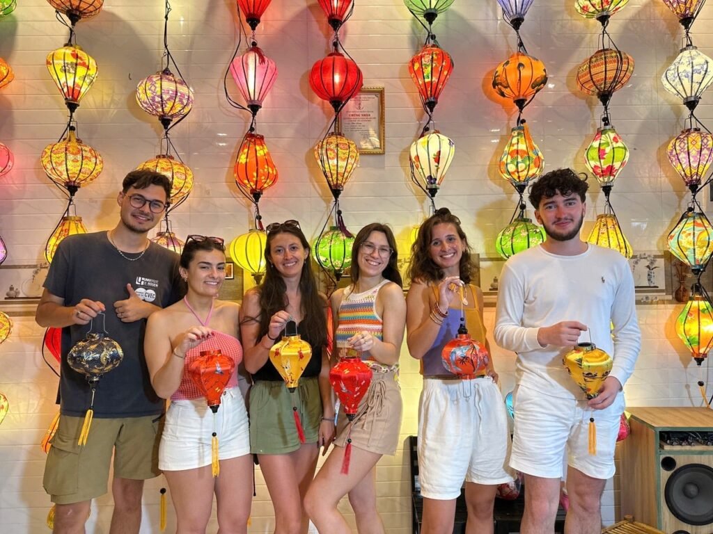Happy friends enjoying lantern making Hoi An